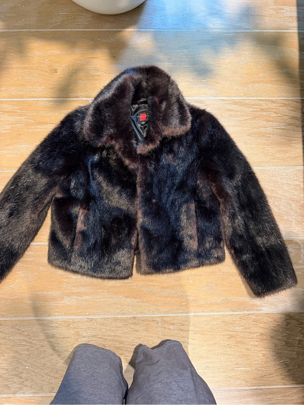 Faux fur lined coat label
